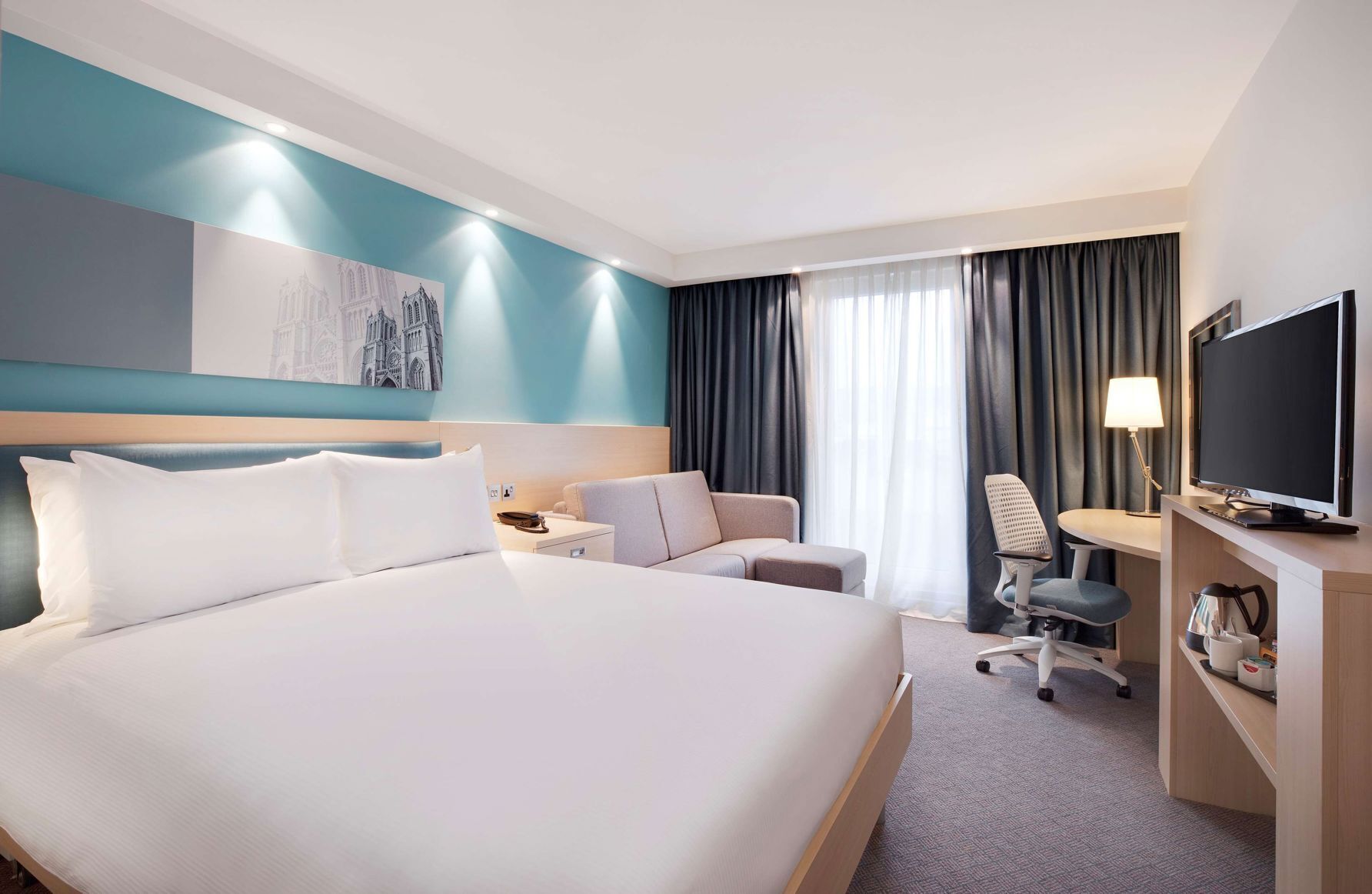 Hypo-allergenic bedding, in-room safe, desk, laptop workspace