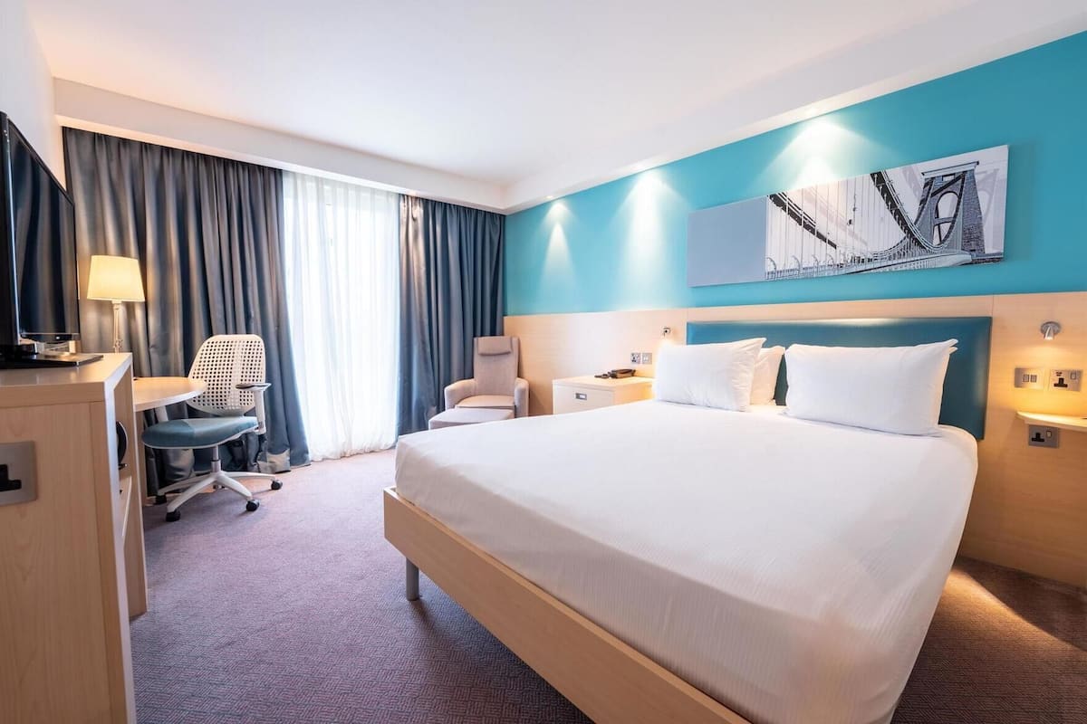 Hypo-allergenic bedding available, in-room safe, desk, laptop workspace