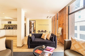 Standard Apartment, 2 Bedrooms, City View | Living area | Flat-screen TV, iPod dock