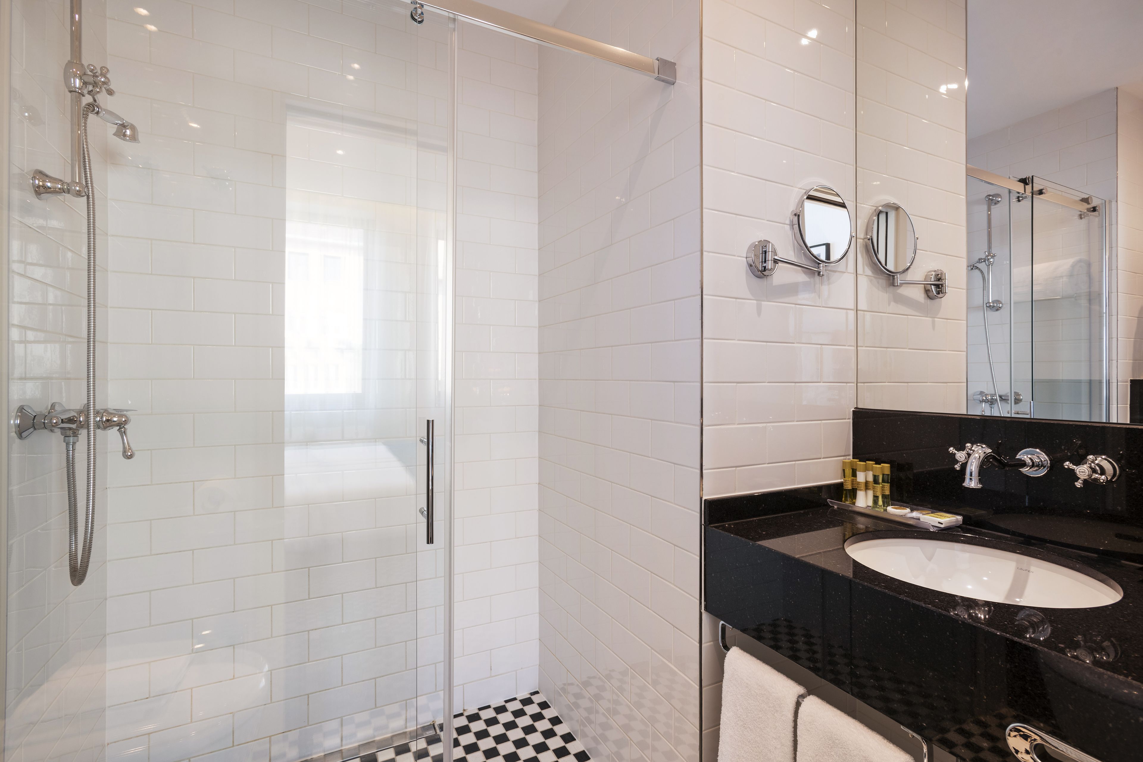 shower, eco-friendly toiletries, hair dryer, slippers