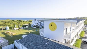 Enjoy a family-friendly stay with a cheerful view of the ocean from this coastal property's balcony.
