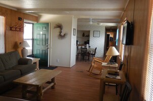 Deer Crossing Mobile Home | Living area | 32-inch TV with cable channels