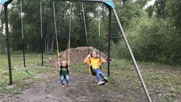 Enjoy a serene swing in a peaceful natural setting.