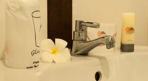 Shower, free toiletries, towels, soap