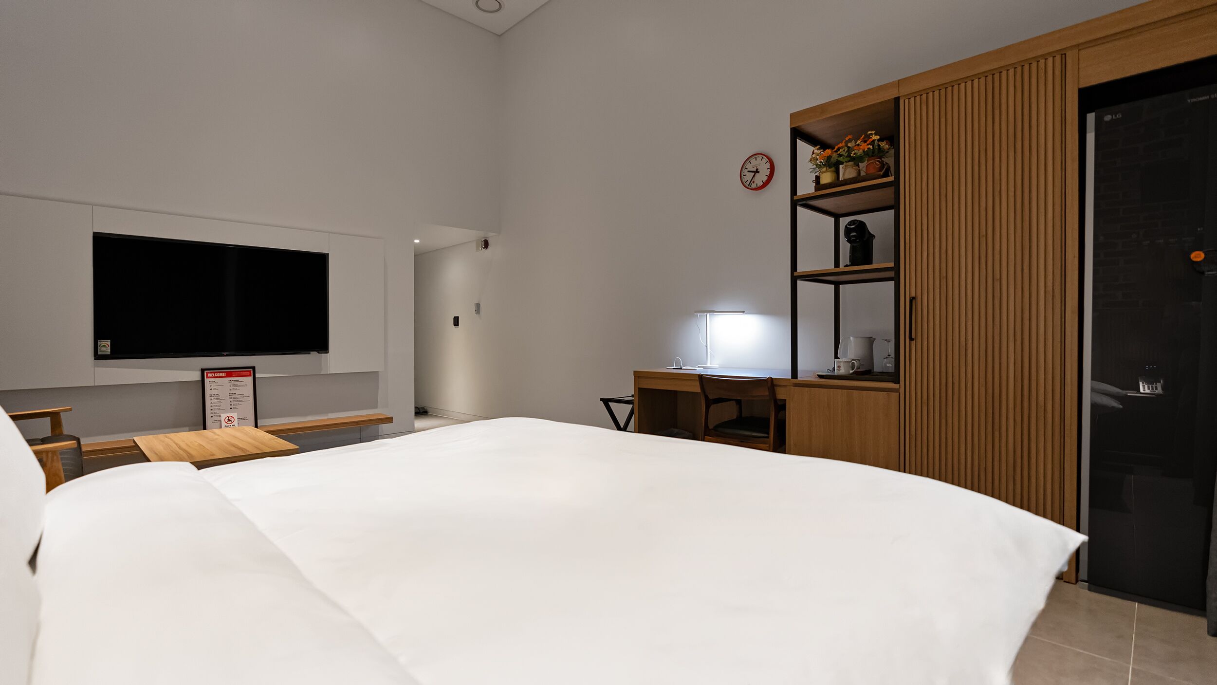 premium double room | premium bedding, down duvets, individually decorated, desk