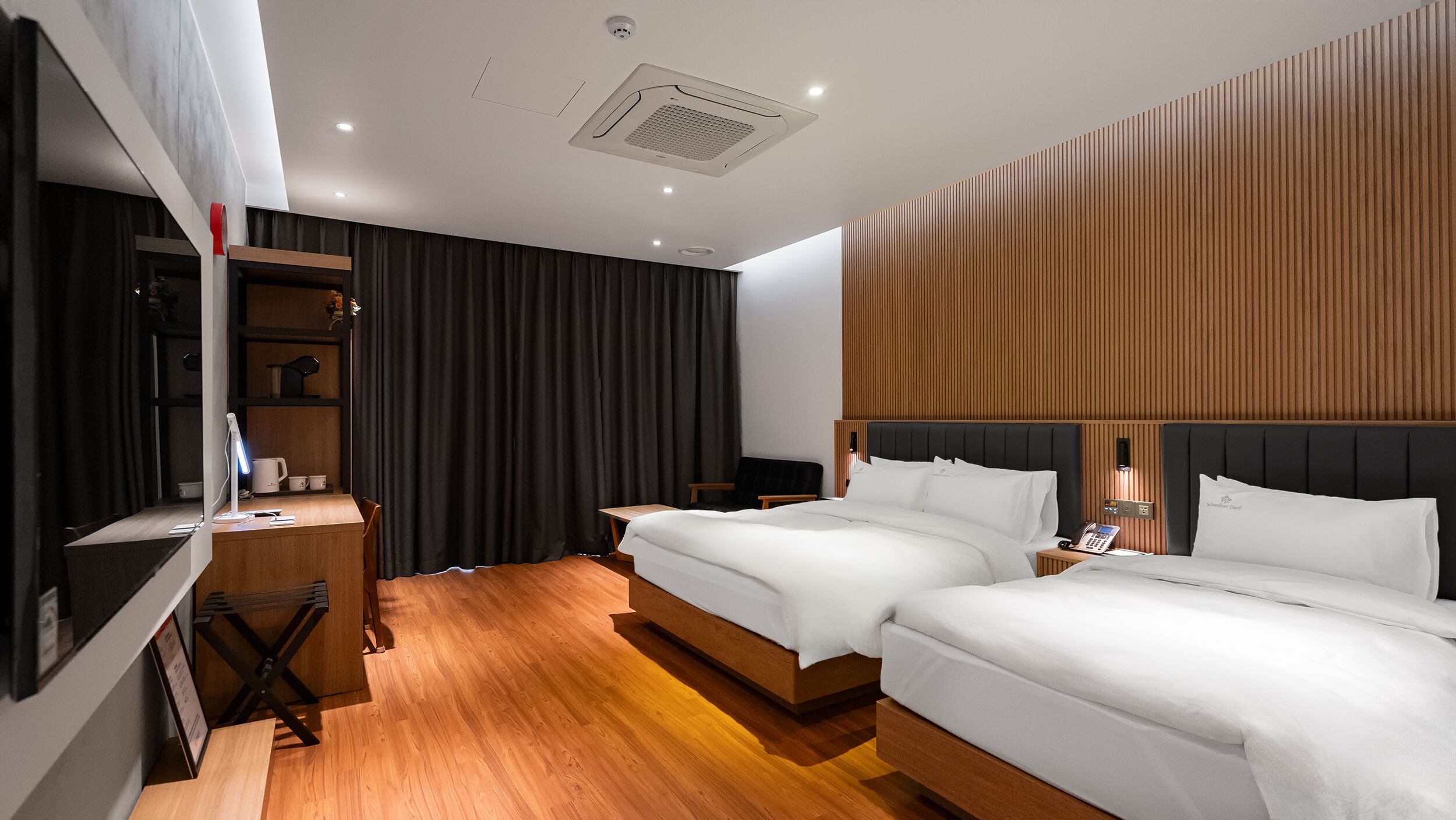 deluxe twin room | premium bedding, down duvets, individually decorated, desk