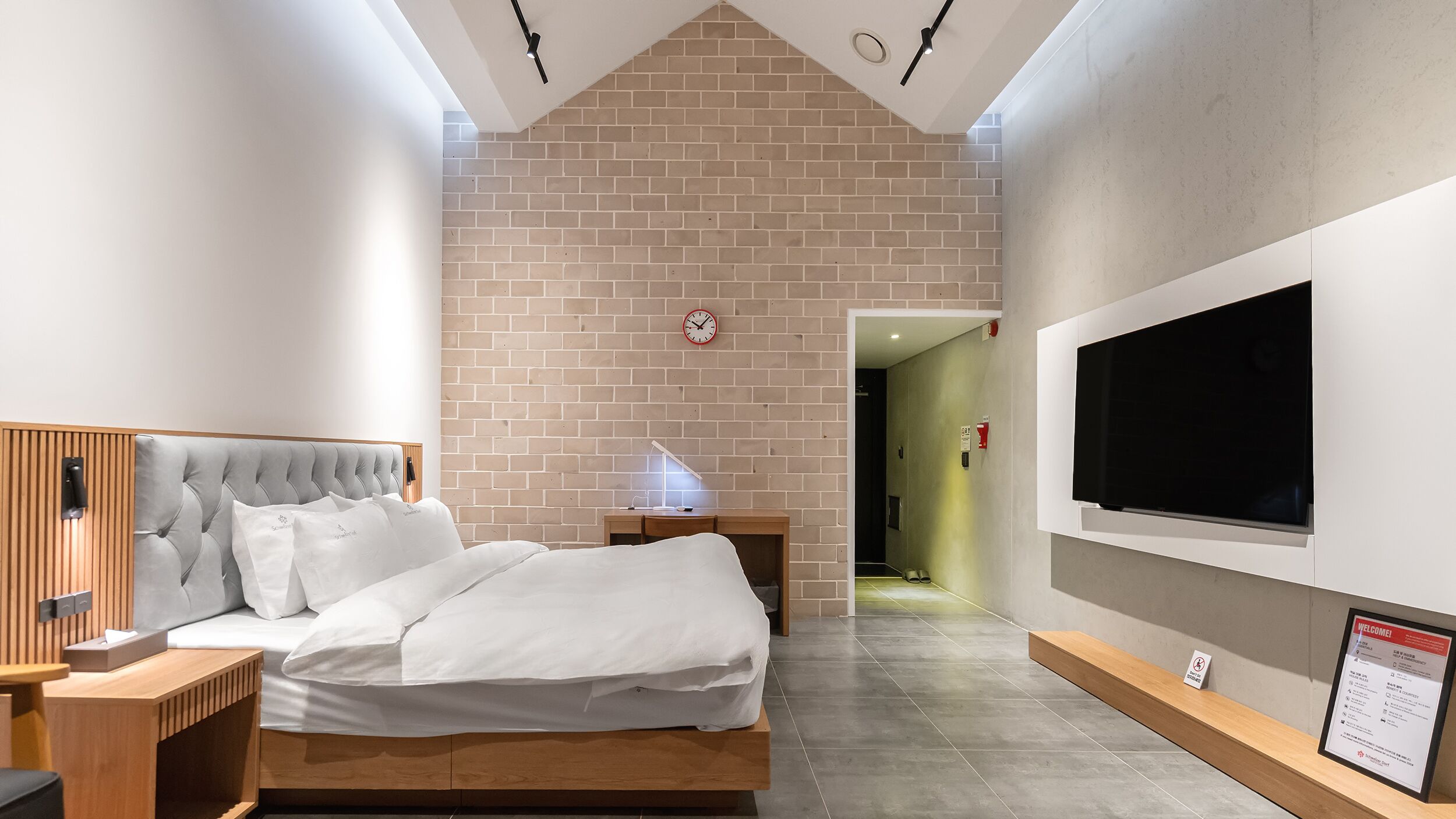 premium double room | premium bedding, down duvets, individually decorated, desk