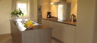 Rural holiday home with outdoor pool & sauna.