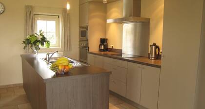 Rural holiday home with outdoor pool & sauna.