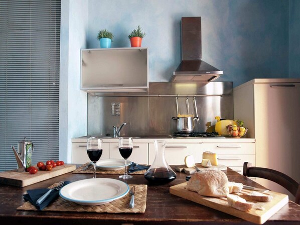 Fridge, stovetop, coffee/tea maker, toaster