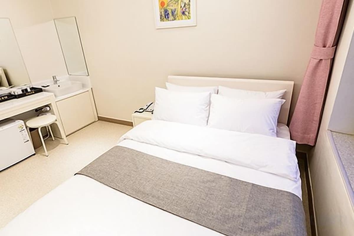 Blackout drapes, soundproofing, iron/ironing board (on request)