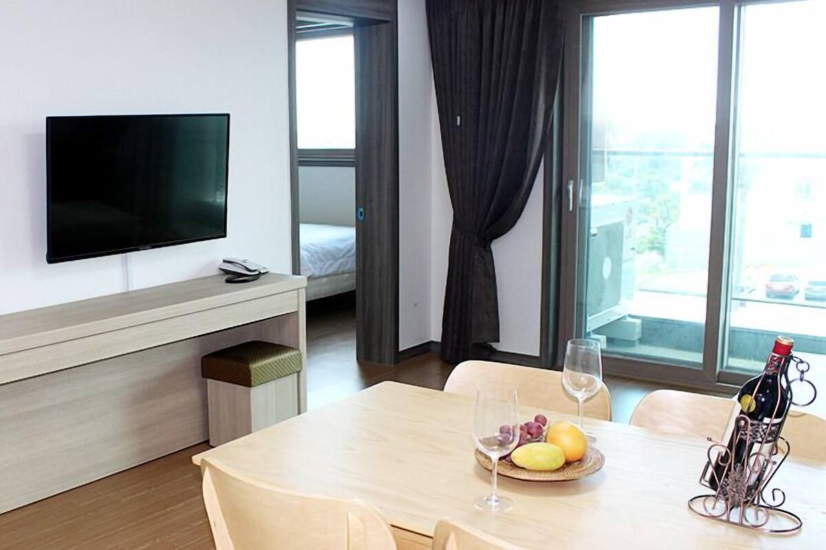 Suite Prestige | Aire de séjour | Téléviseur à écran plat
