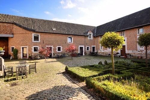 Nice apartments in a monumental square farm.
