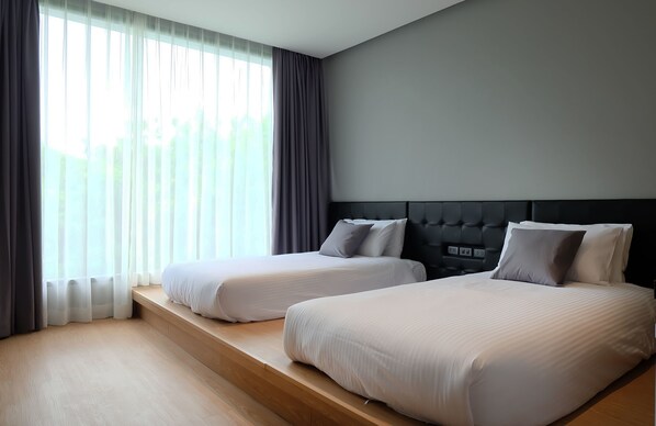 Superior tvåbäddsrum | Sängtillbehör av högsta kvalitet, minibar och skrivbord