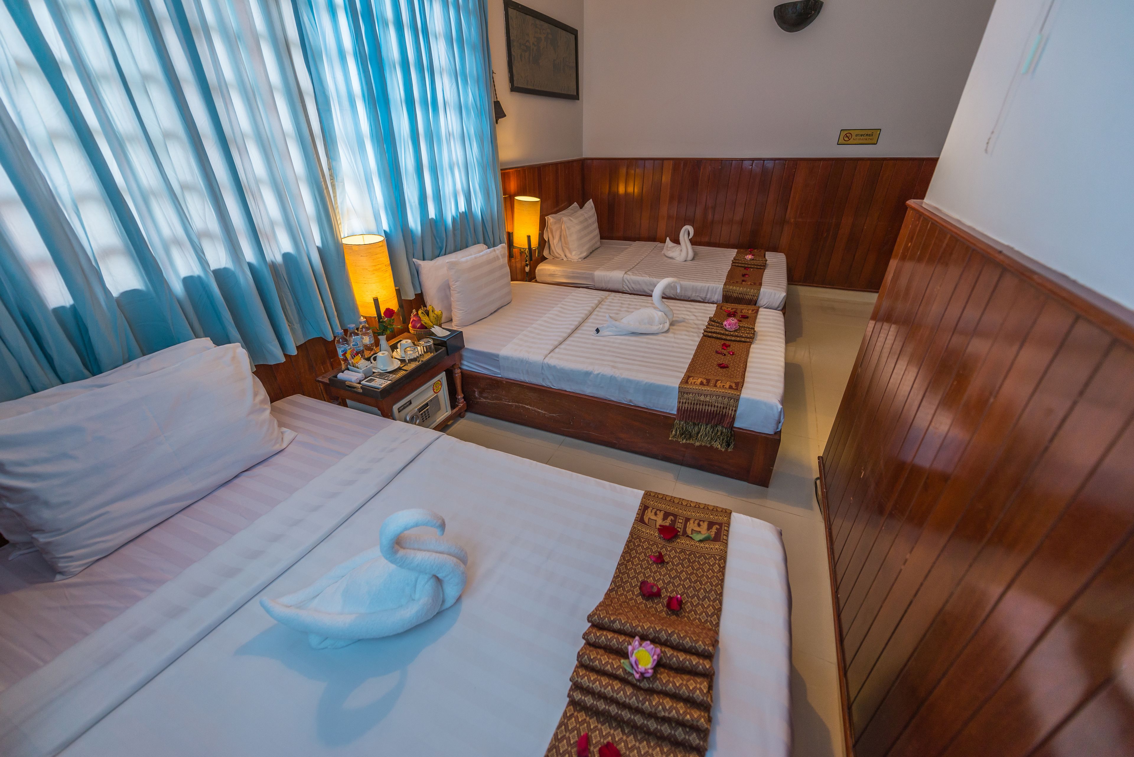 deluxe triple - free airport pick up | premium bedding, minibar, in-room safe, desk