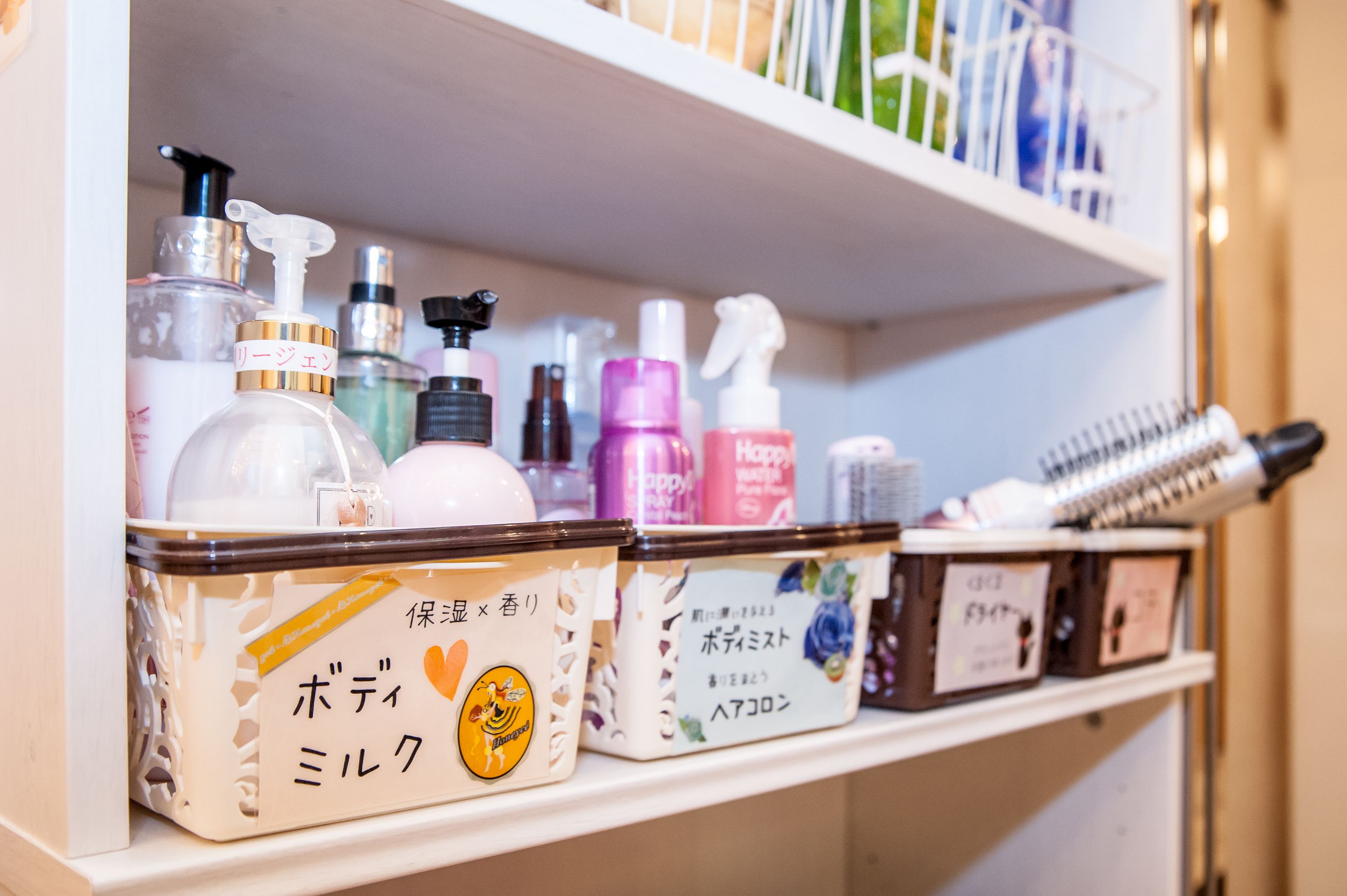 A shelf with various personal care products, including bottles and containers.