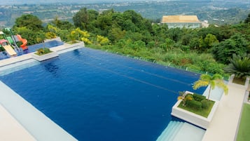 2 outdoor pools, open 8:00 AM to 7:30 PM, cabanas (surcharge)