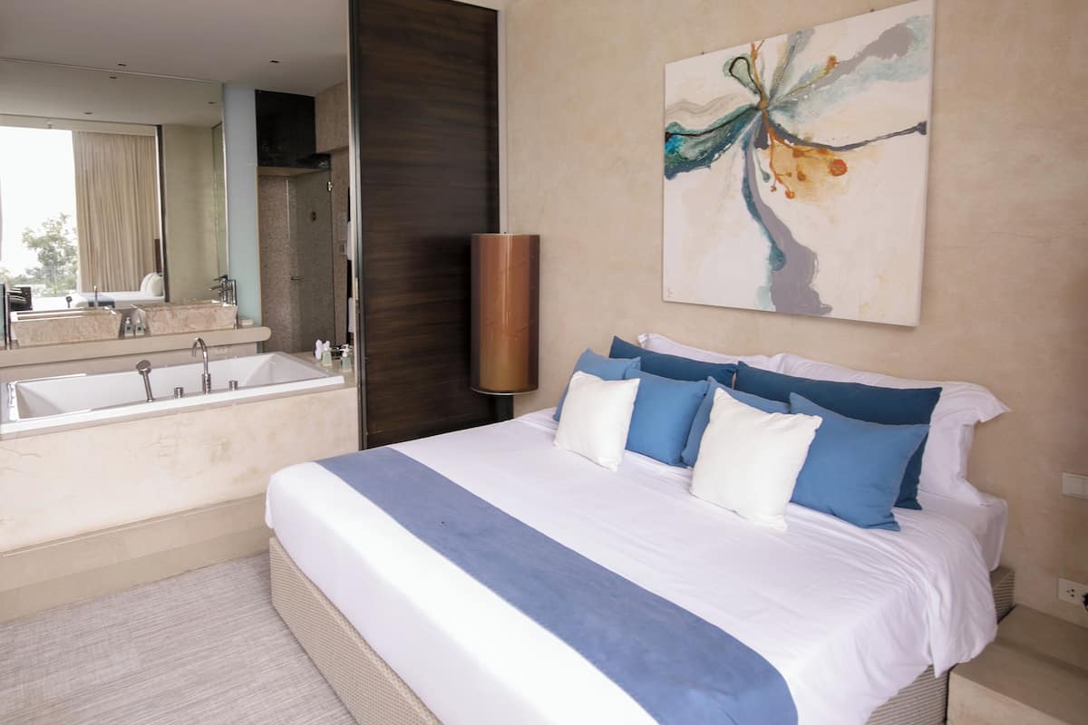 Honeymoon Villa, 1 Bedroom, Partial Ocean View | Minibar, in-room safe, desk, laptop workspace