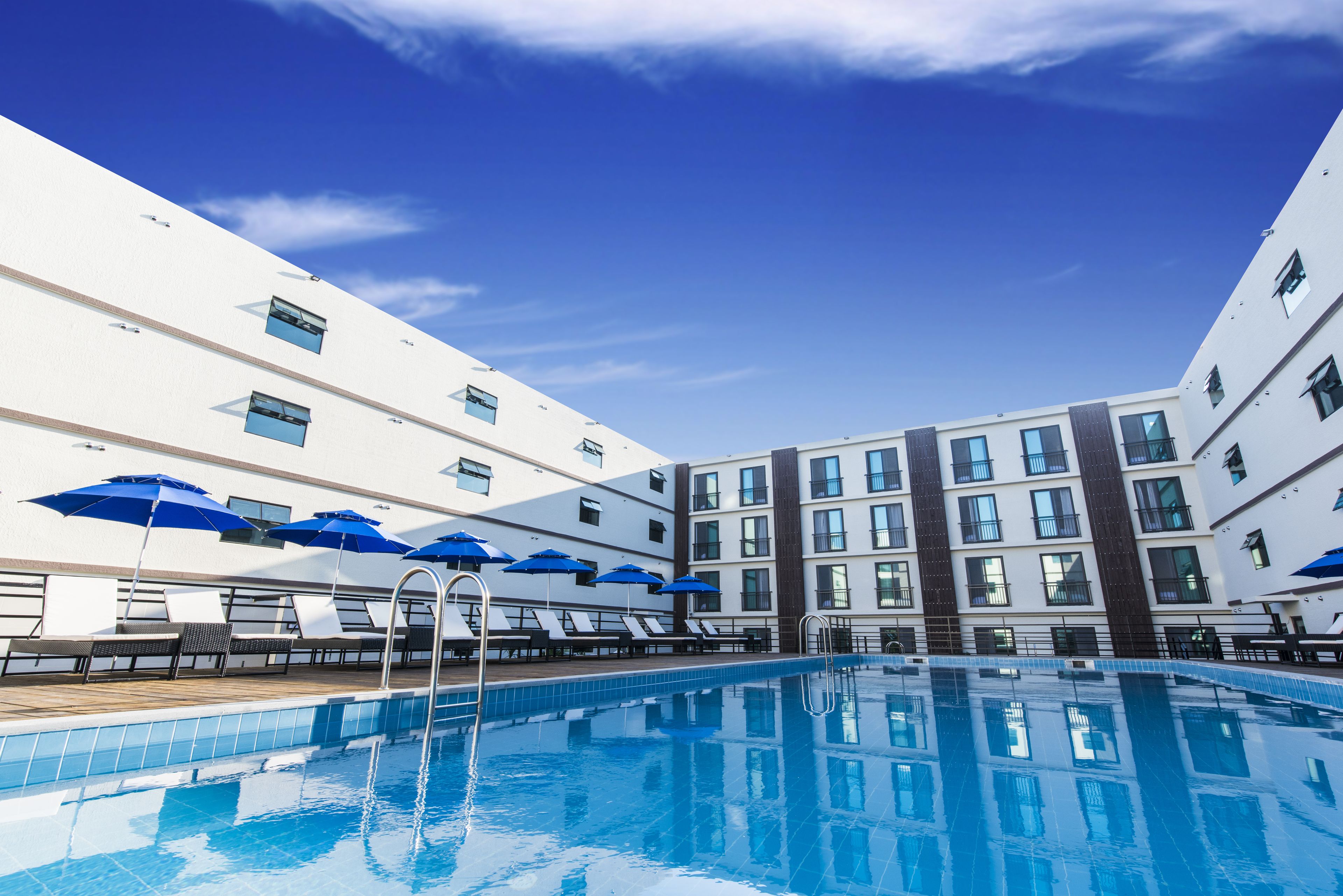 Seasonal outdoor pool, open 3:00 PM to 10:00 PM, sun loungers