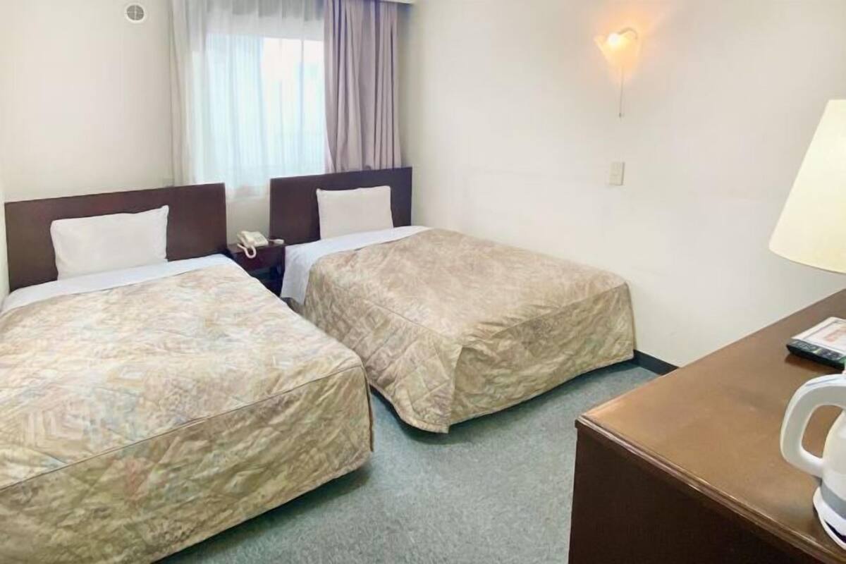 Desk, blackout curtains, iron/ironing board (on request), free WiFi