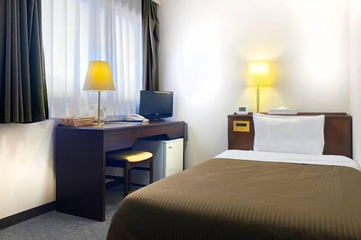 Desk, blackout curtains, iron/ironing board (on request), free WiFi