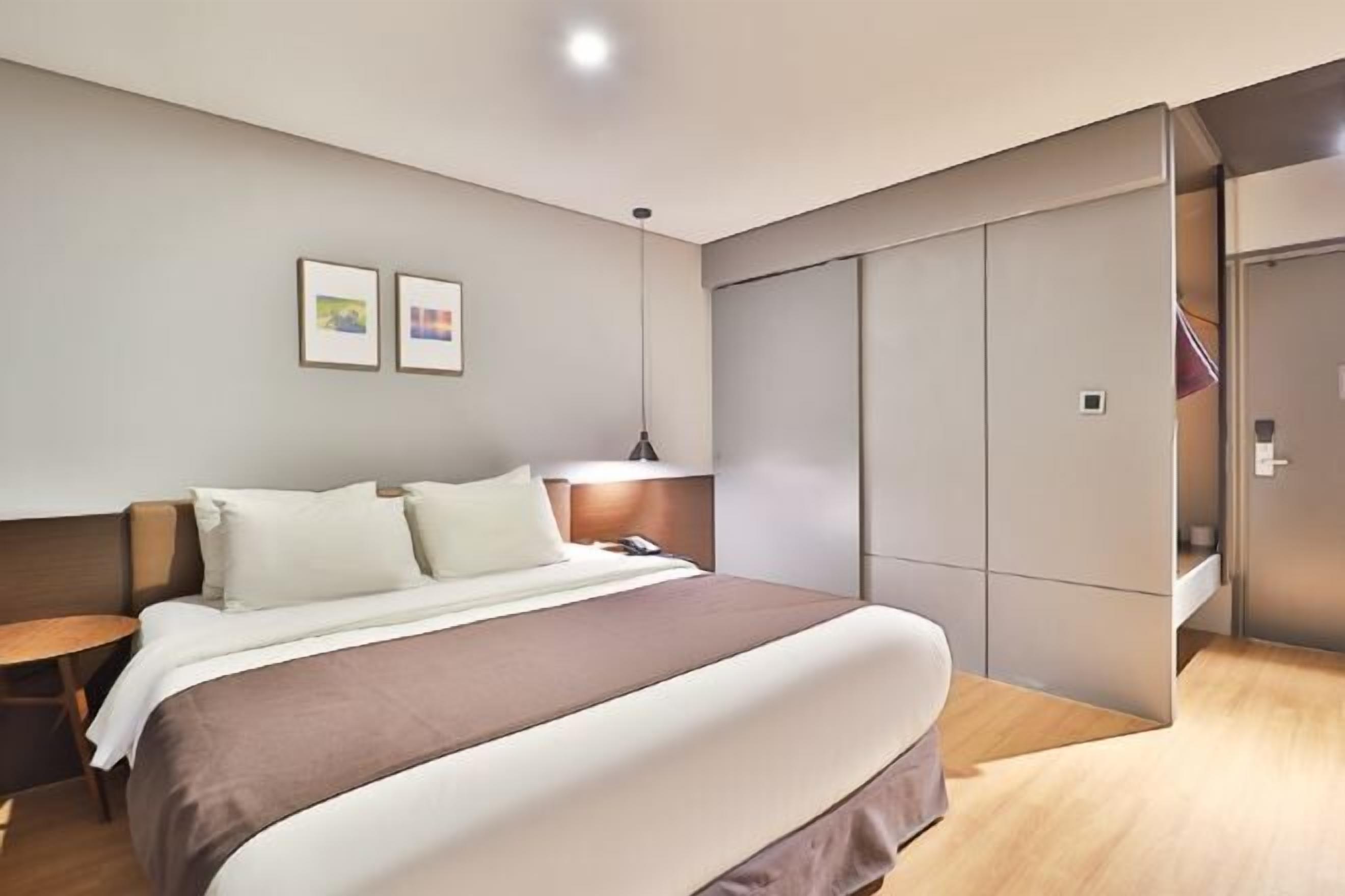 Premium bedding, down comforters, memory foam beds, in-room safe