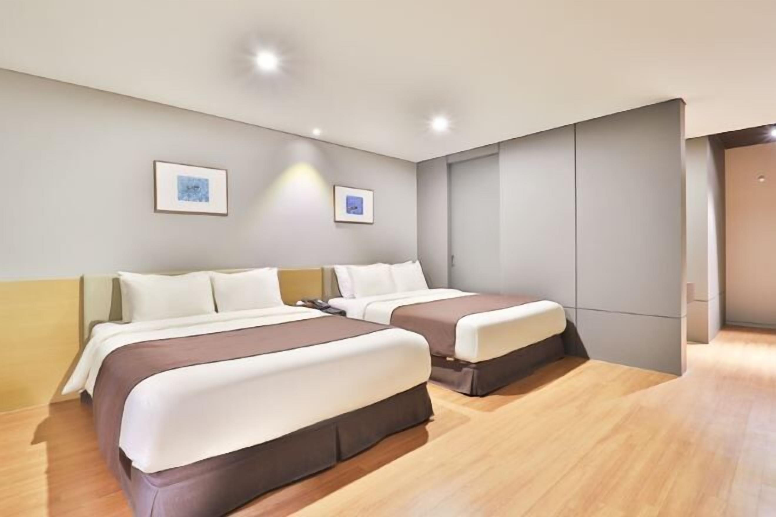 Premium bedding, down comforters, memory foam beds, in-room safe