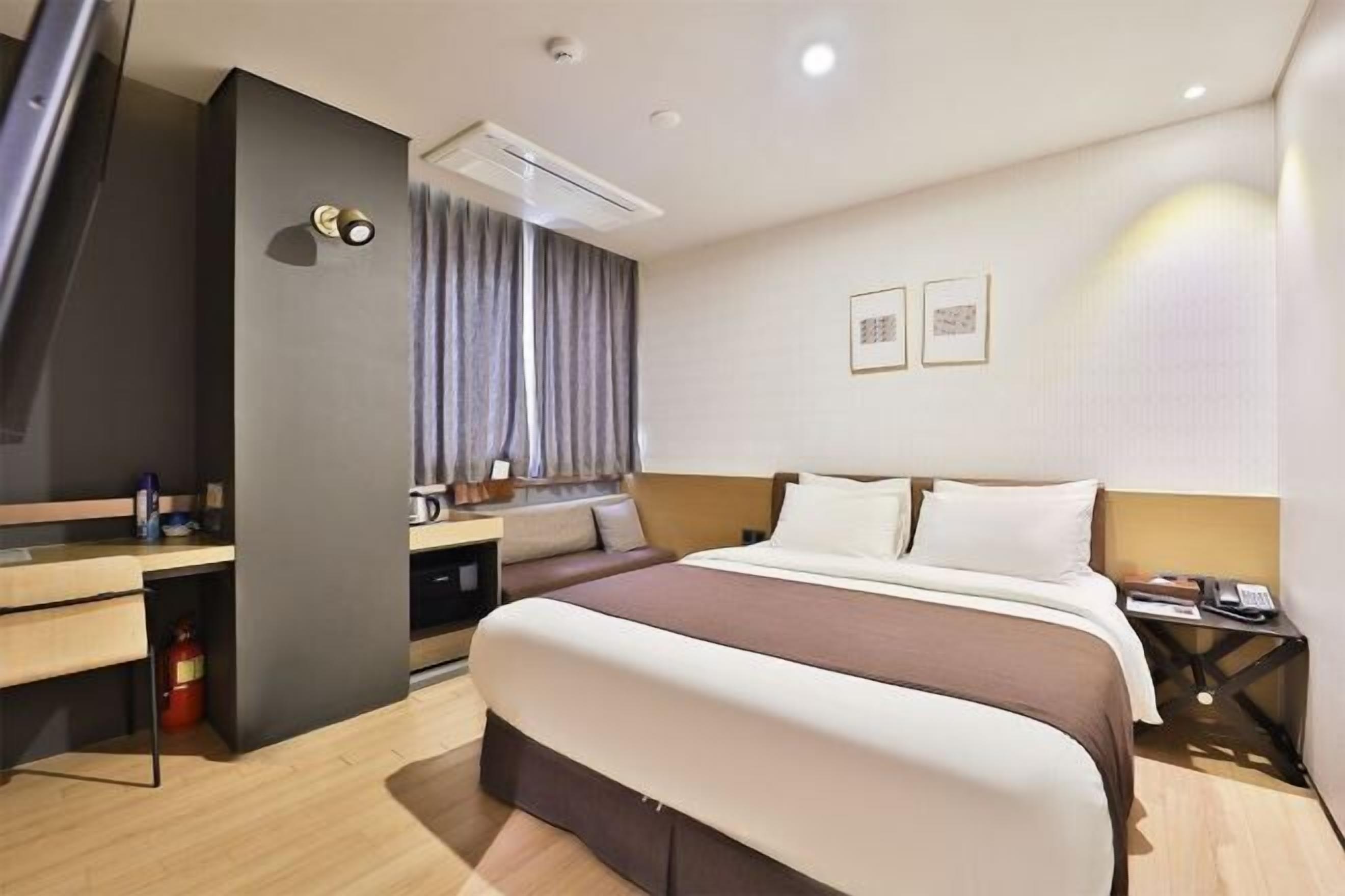 Premium bedding, down comforters, memory foam beds, in-room safe