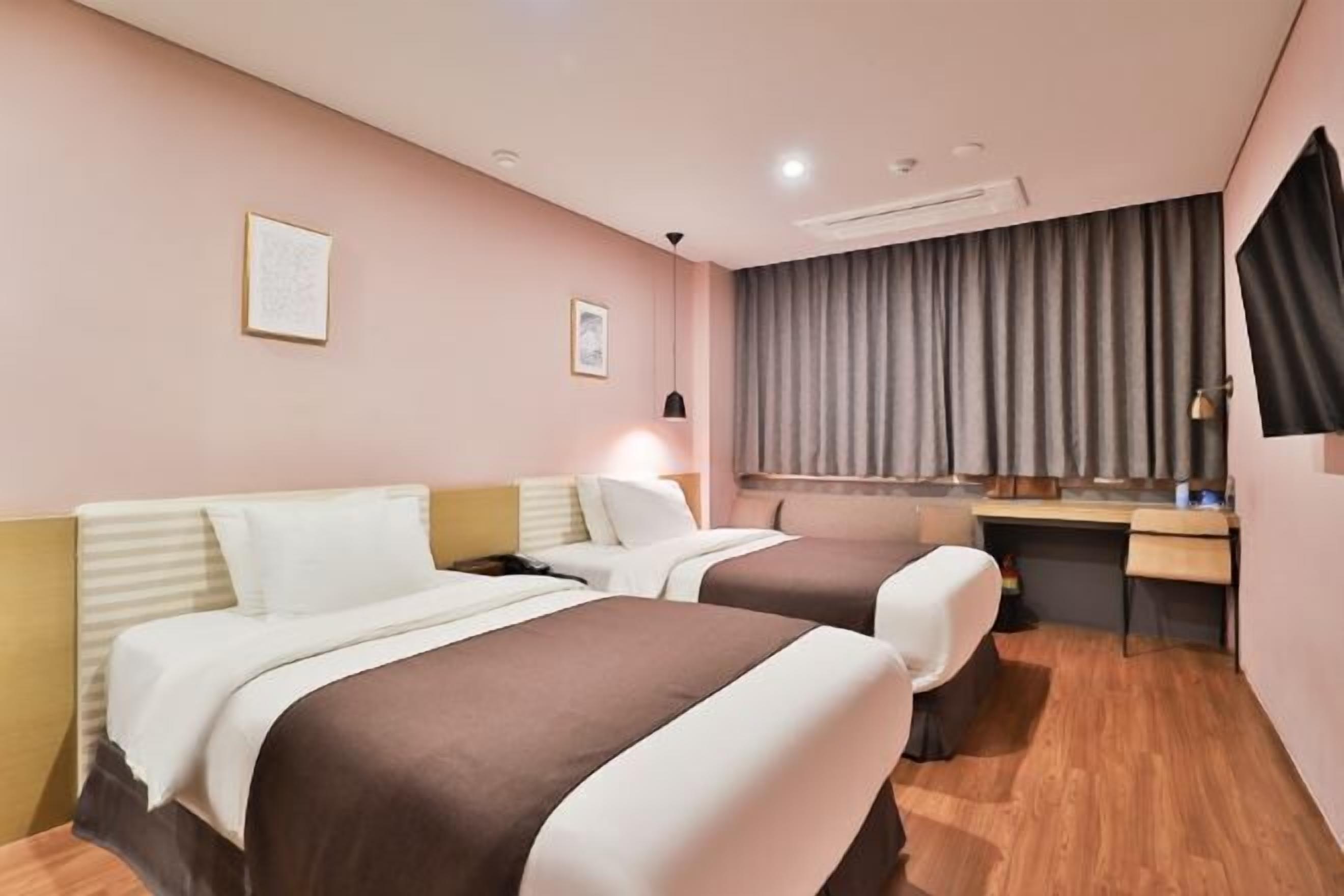 Premium bedding, down comforters, memory foam beds, in-room safe