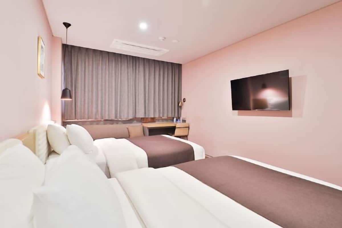 Premium bedding, down comforters, memory foam beds, in-room safe