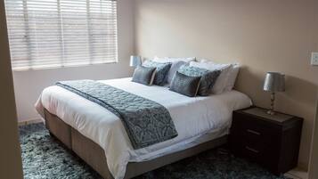 Standard Townhome, 1 Bedroom, Kitchenette, Ground Floor | 1 bedroom, desk, iron/ironing board, free WiFi