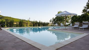 Outdoor pool, pool umbrellas, pool loungers