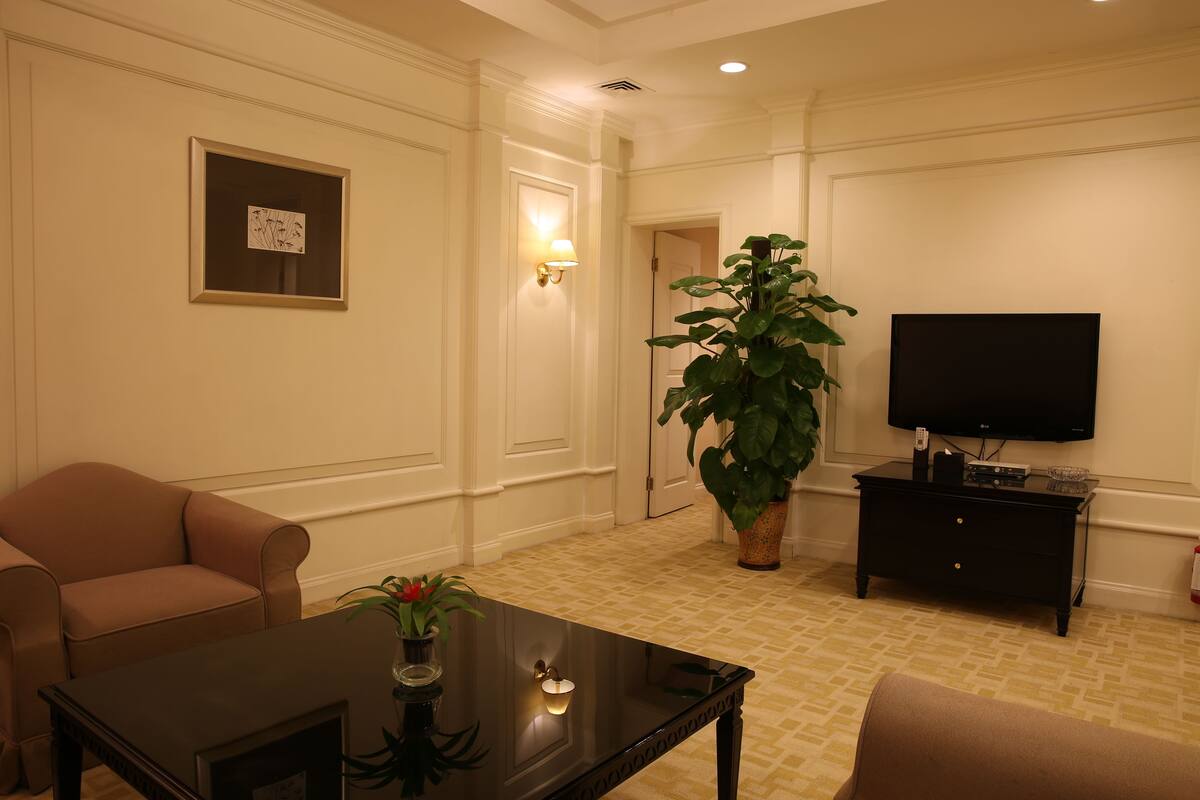 Suite superior | Sala de estar