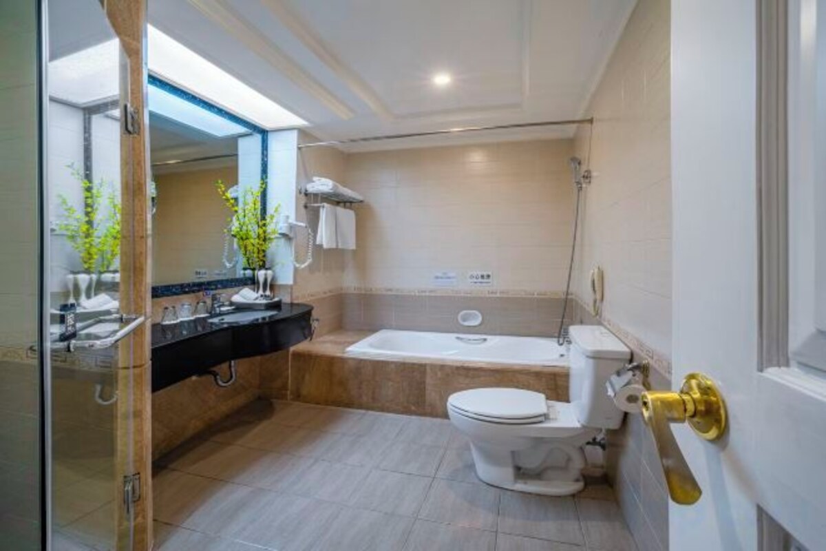 Bathroom | Separate tub and shower, free toiletries, slippers