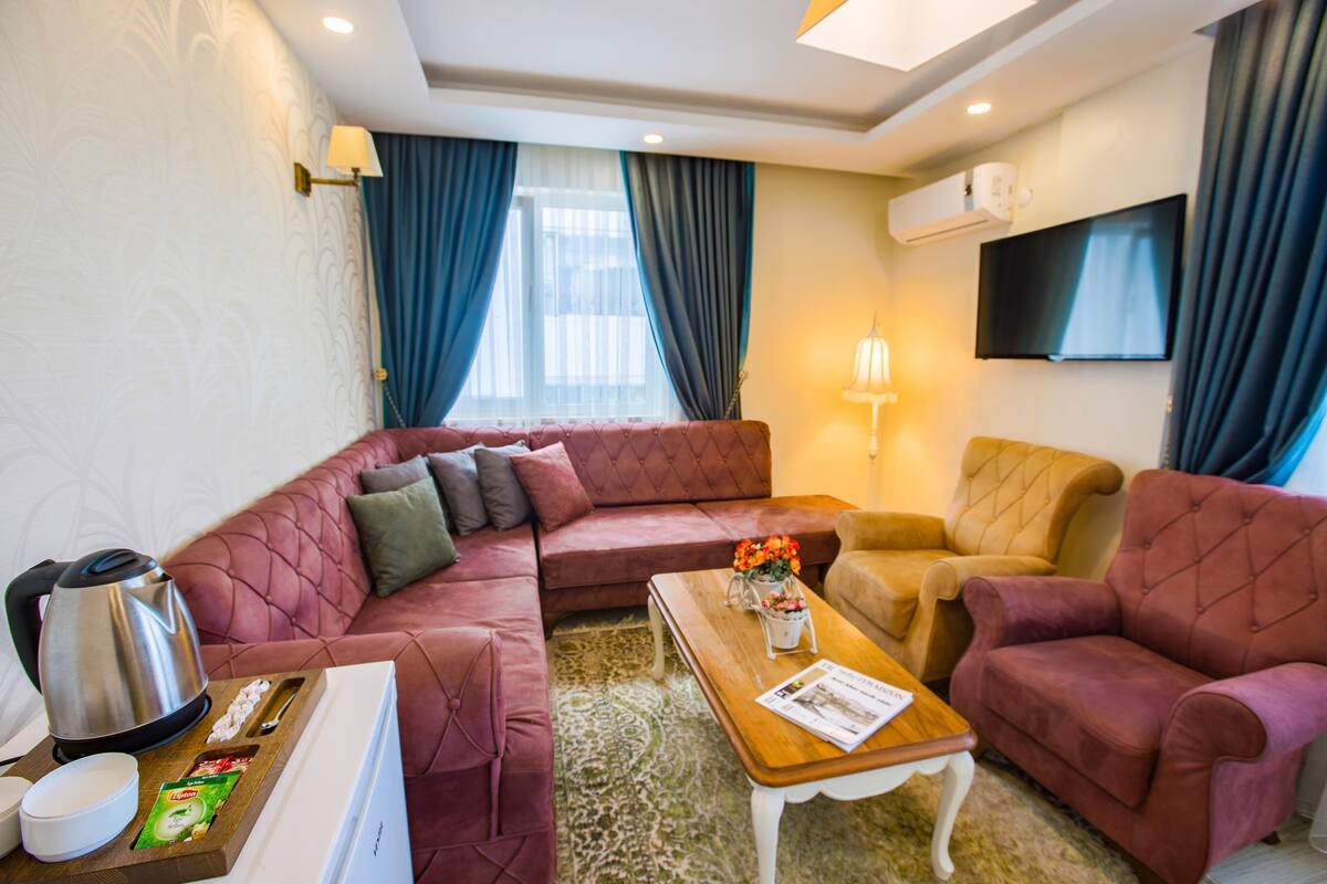 Family Suite | Living room | LED TV
