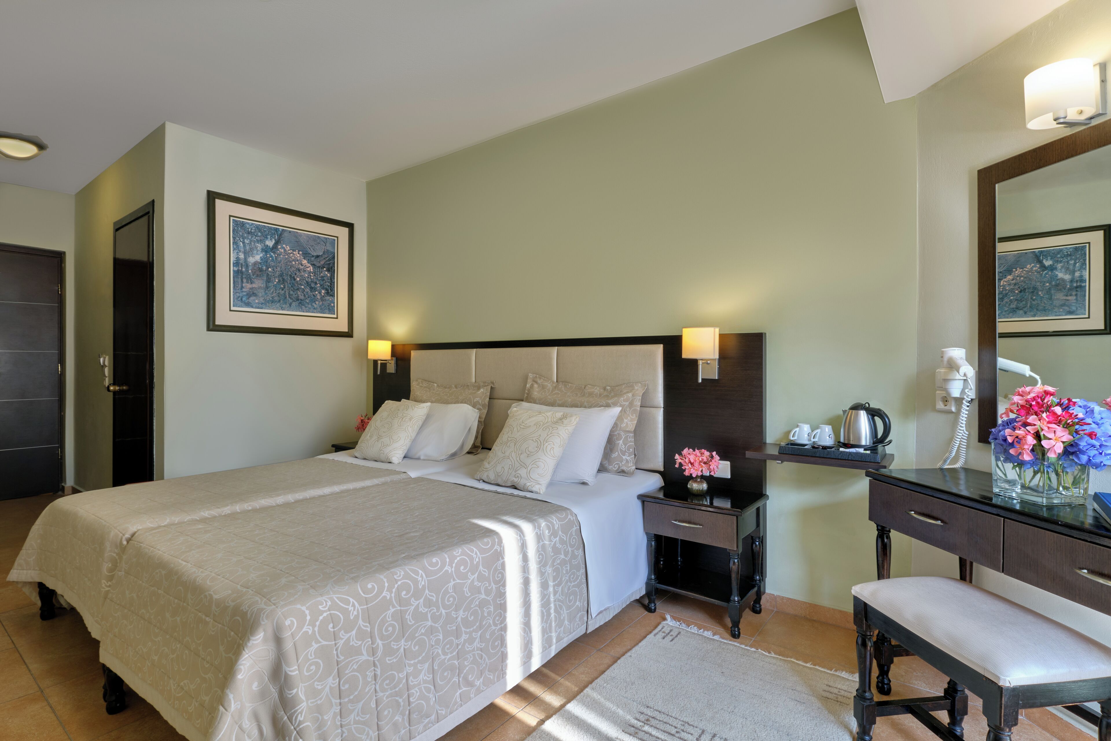 standard room, garden view | in-room safe, desk, soundproofing, iron/ironing board