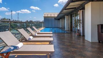 Outdoor pool, sun loungers