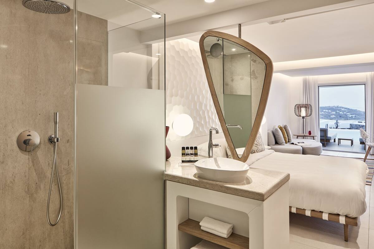 shower, rainfall showerhead, designer toiletries, hair dryer