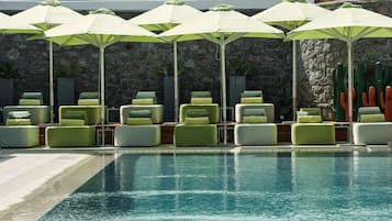 Seasonal outdoor pool, pool umbrellas, pool loungers