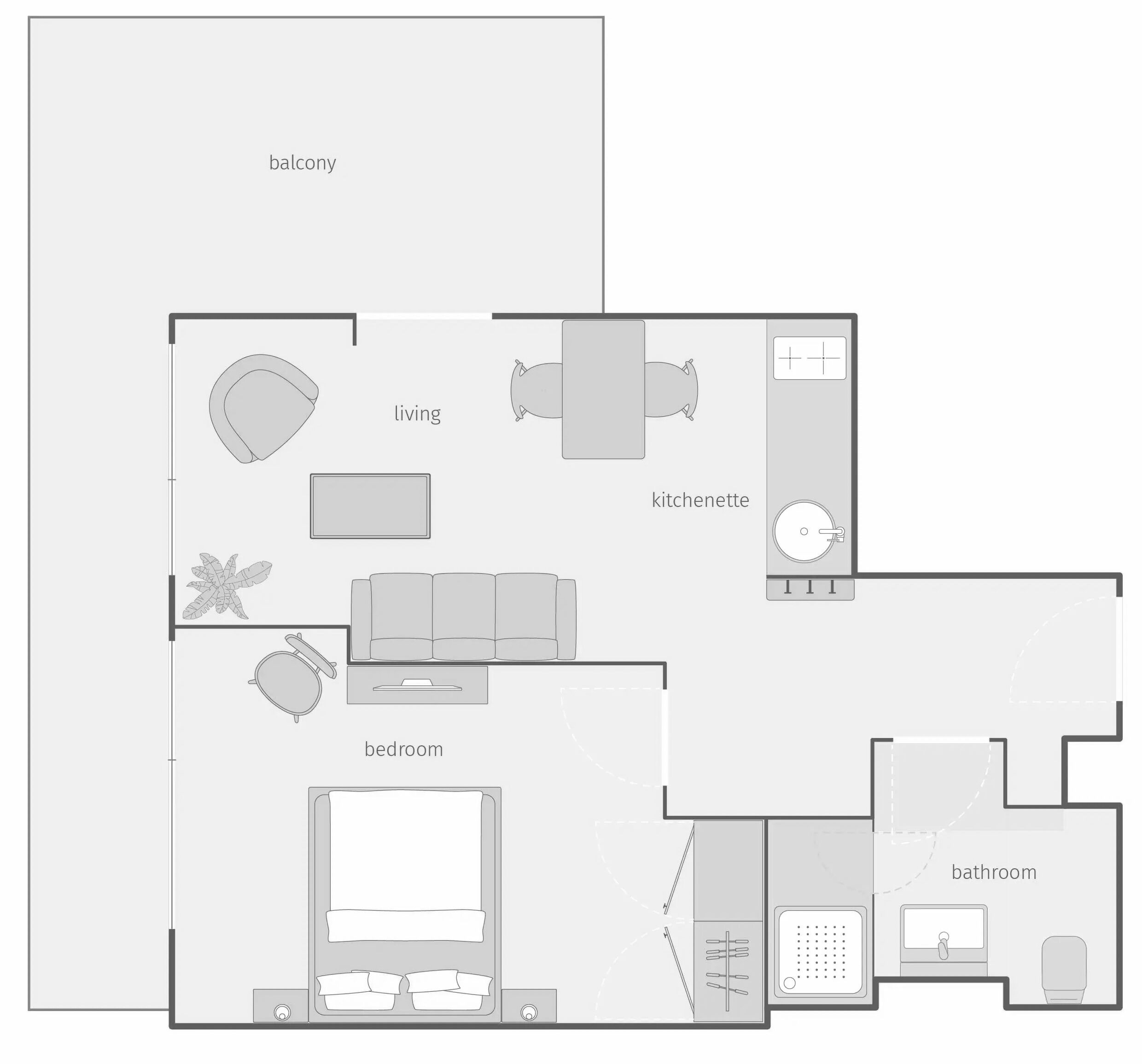 A floor plan of a hotel with a balcony, living room, kitchenette, bedroom, and bathroom.