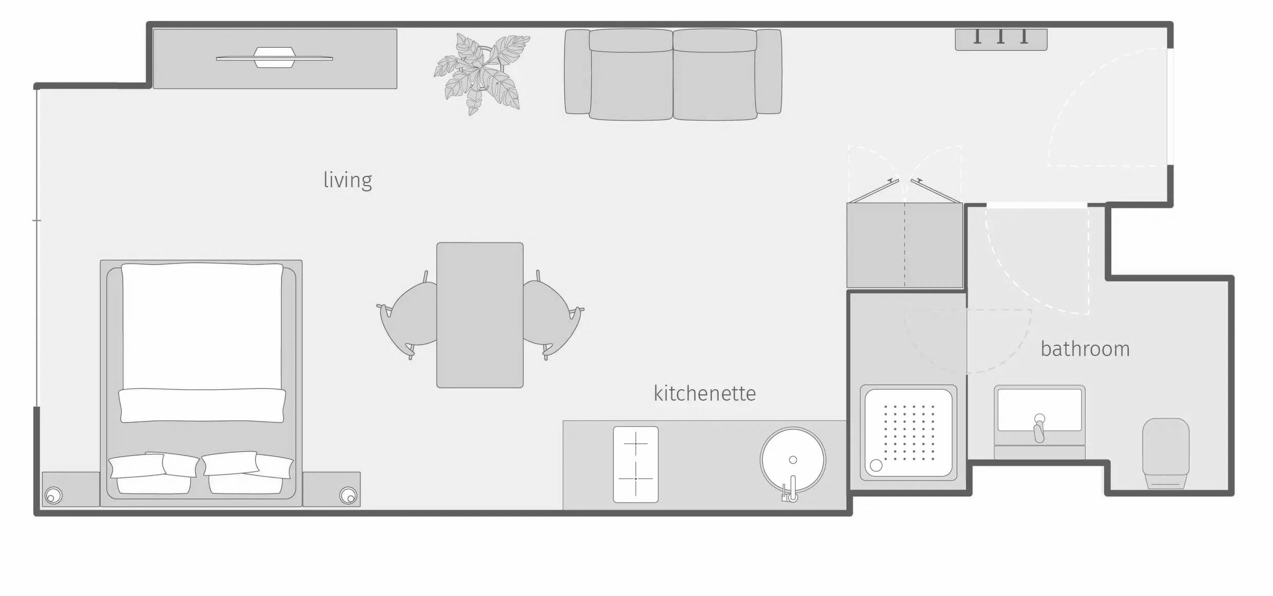 A floor plan with a living room, kitchenette, and bathroom.