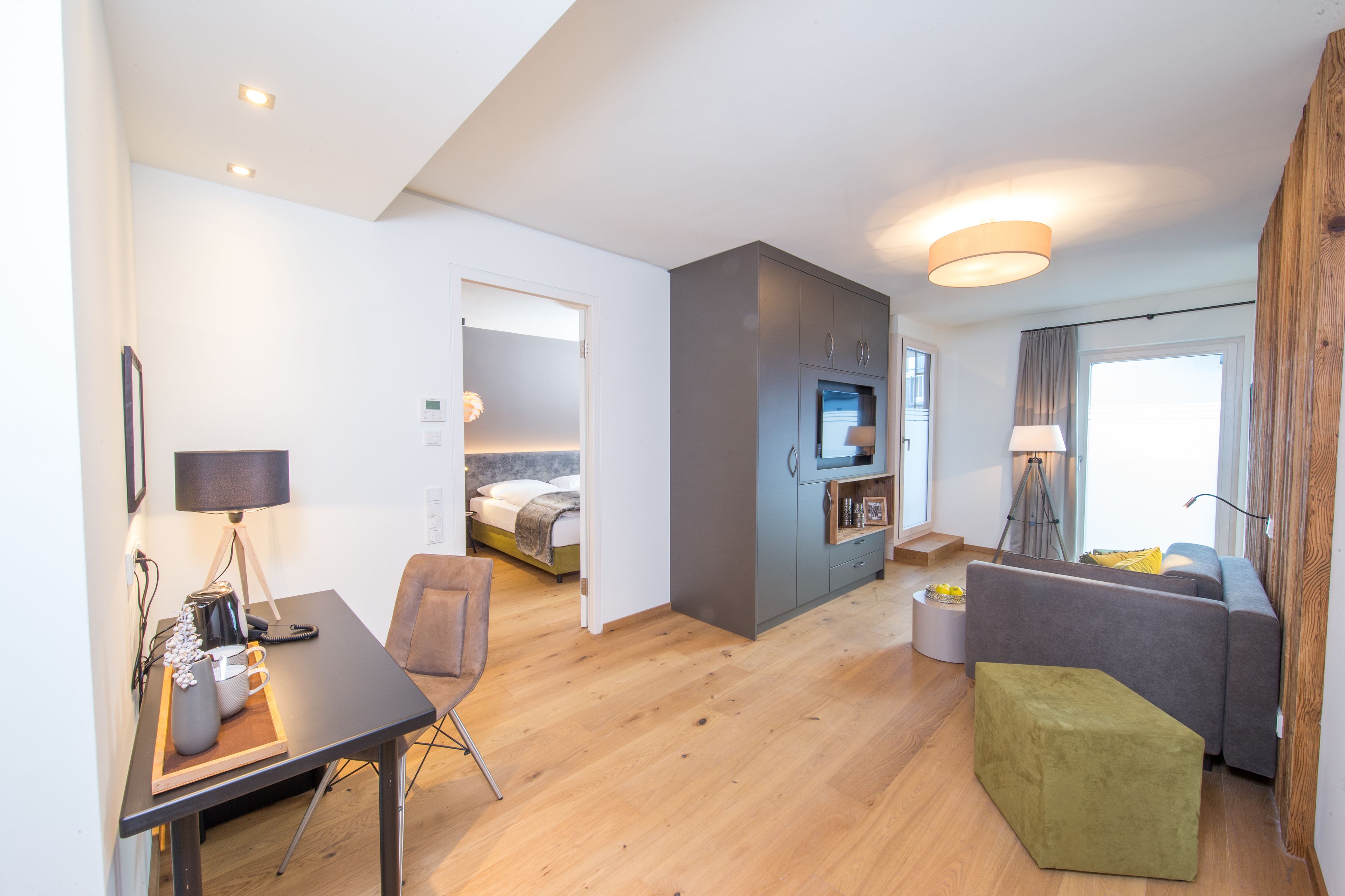 Deluxe Suite mit Balkon | Ropa de cama de alta calidad, minibar, caja fuerte y escritorio