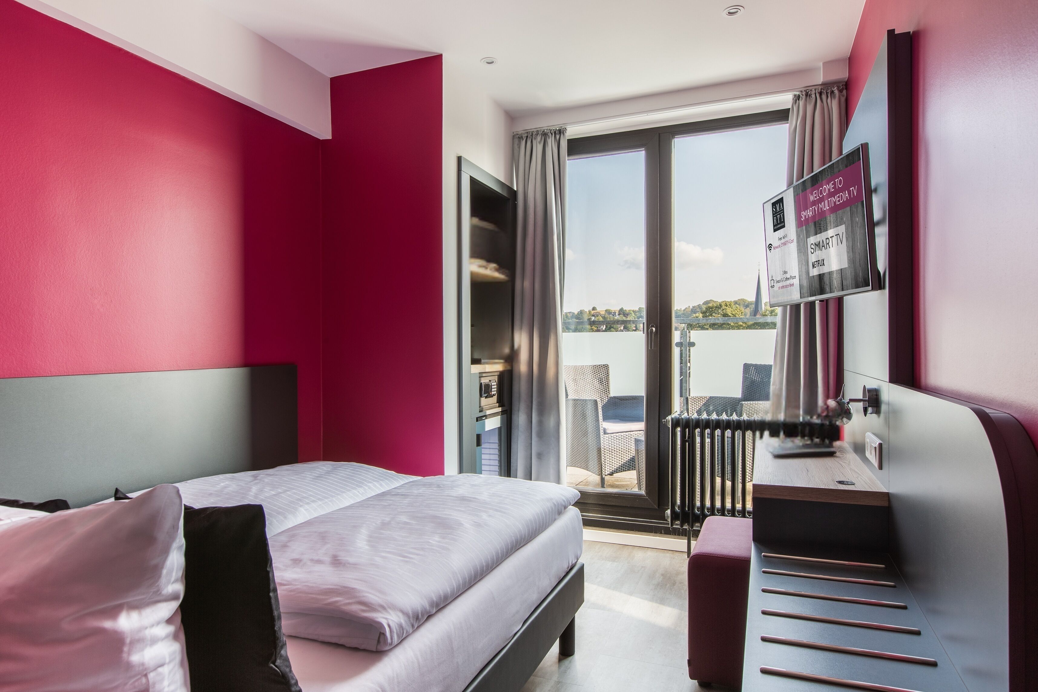 Standard Double Room, Balcony | Minibar, in-room safe, desk, free WiFi