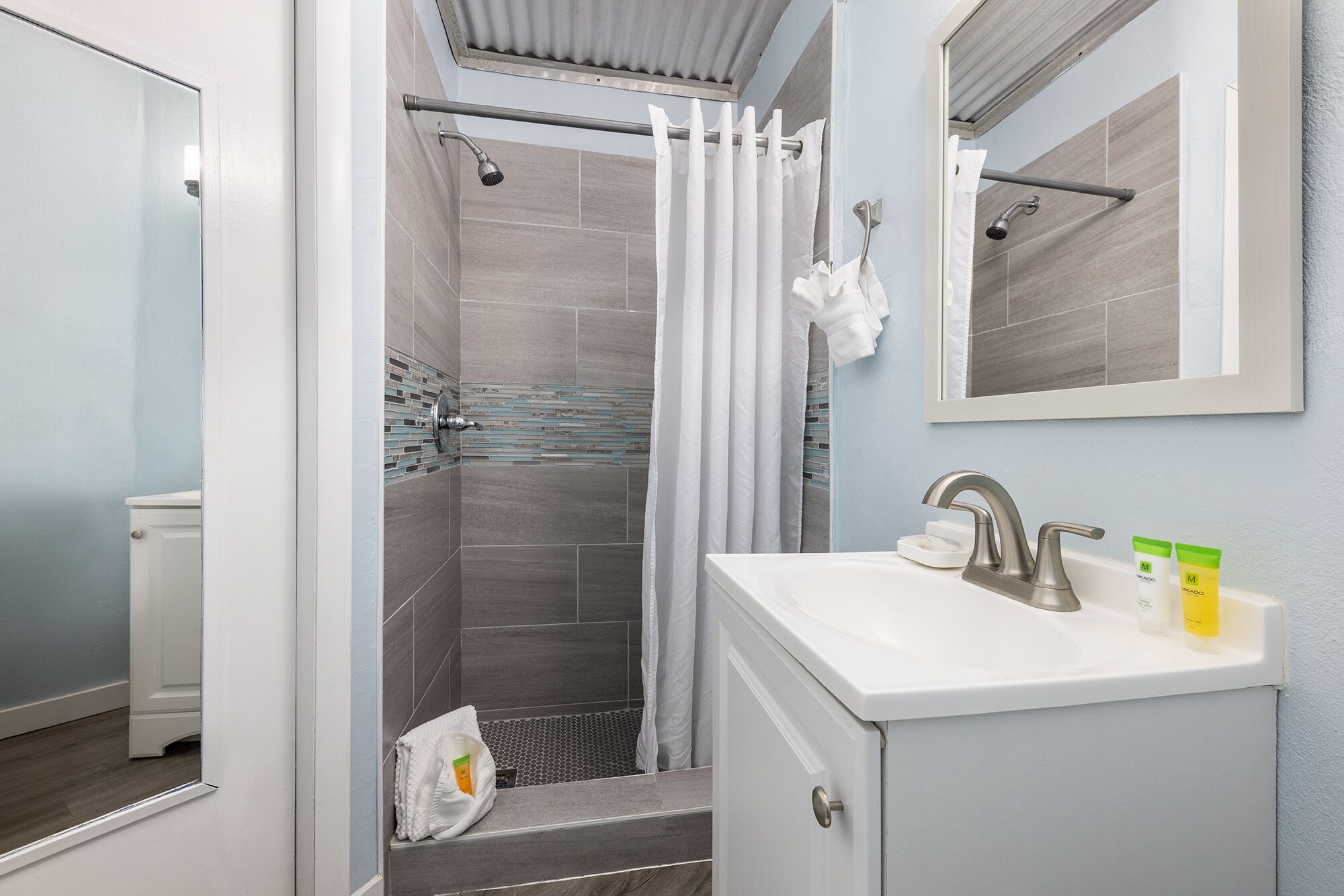 superior bungalow, multiple beds, beachfront (ground level sleeps 6) | bathroom | shower, towels, soap, shampoo