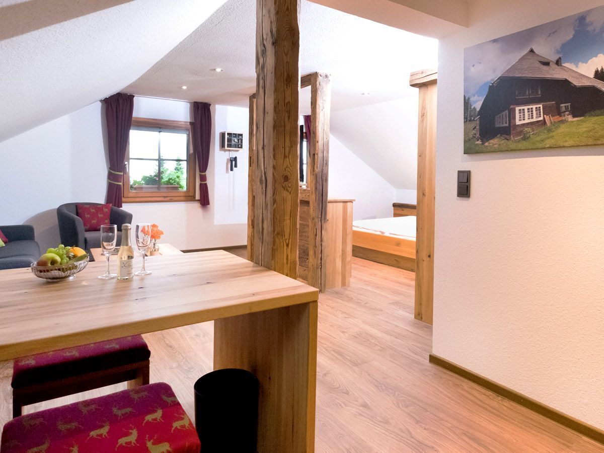 junior suite | living area | flat-screen tv