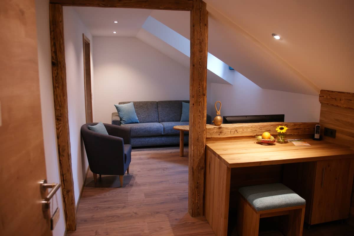 family suite, 2 bedrooms | living room | flat-screen tv