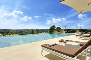 3 outdoor pools, pool umbrellas, sun loungers