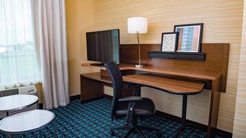 Desk, laptop workspace, blackout drapes, iron/ironing board