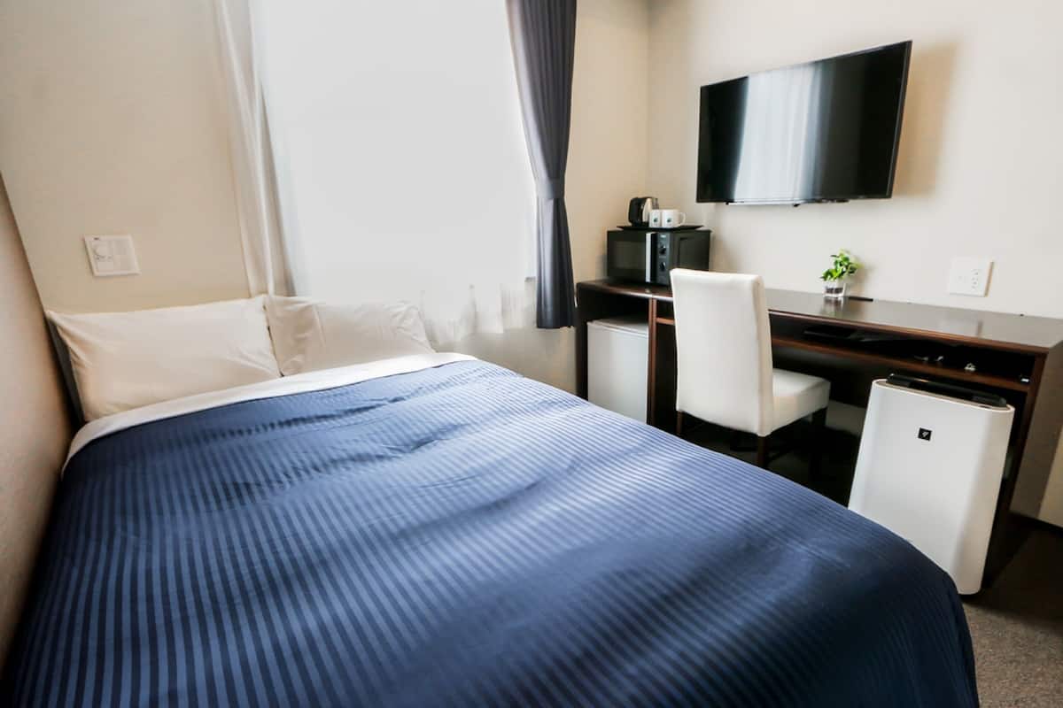 Premium bedding, desk, blackout curtains, bed sheets
