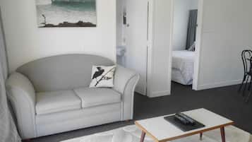 Apartment, 2 Bedrooms | Living room | Flat-screen TV